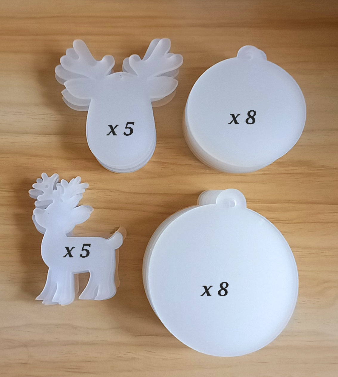 Clear acrylics.. 10 x 7cm reindeers, 8 x 7cm baubles, 8 x 8cm baubles.